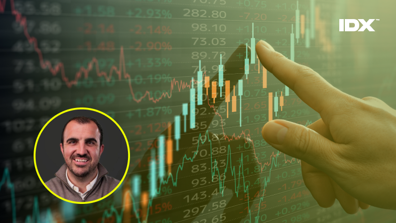 A representation of a stock exchange with an inset of Chris Corrigan